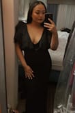 The way that this dress hugged my body was unreal! It fits like a glove but is still incredibly comfortable to move and sit in. I was so excited to wear it to a wedding last weekend. I don't own anything like it and the tulle flutter sleeves just added a haute couture vibe which I LOVE! I told my boyfriend that I low-key look like I'm channeling my inner modern-day Morticia Addams. We both laughed in agreement. No complaints! The price is amazing and the quality is incredible! I just needed a hem since I'm a shorty, but it's all good. My local seamstress even loved it too, she thought it was so pretty and my shoes just added to it. BTW, it arrived so quickly too (by the next day!) I'm a sucker for an all-black outfit, so please if you're eyeing this piece, get it! - Sharon R.