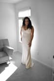 I had been shopping for a classic and elegant wedding dress for a while until my fiance sent me a link to Lulus. The dress fits perfectly, the fabric is soft, thick, and a little elastic so it is not transparent and it fits my body comfortably without worrying about gaining or losing weight. The color is beautiful. It came in time and without any hassle on the day that they promised. The dress came in a box with a bag included and a card. So professional. I will buy more dresses from Lulus. - Marisol M.