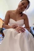 I bought a size 10 by mistake instead of a size 6 forgetting it was a US size and not AU size. I'm glad I did because the dress ran small. Size 8 would have been perfect. In saying that, the dress is super easy to alter. I love the style and the quality of the dress. Would definitely recommend - Wendy L.