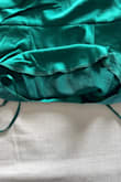 I got the dress in the mail and expected what was in the photo. Instead, I got a cheaply made, loose-fitting disaster. The dress came wrinkled, misshapen and looked nothing like the pictures. They also wouldn't give me a refund so now I'm stuck with a dress I don't want that doesn't fit. - Paige H.