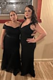 The fabric was stretchy! I'm also usually a size 12/14 jeans. So, once I was able to figure out the straps in the back and slide it on, it fit like a glove! I do recommend maybe sizing up to put a shaper underneath. I did not. It still fit well and was flattering. My back rolls were a little bulgy but it was fine. - Denise E.