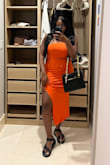 The color really complements my skin tone. The dress is very flattering and looks good in all the right places! It fits perfectly! - Ganiyat L.