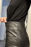 This skirt is so comfy. Often, pencil skirts are tight all the way through, but I had space in the waist, even though the hips were tight. So much more comfortable. The only thing I don't love is that the seam on the front and back is just thread with no backing, so you can technically see through it, but you'd have to look really hard. - Kaitlyn W.