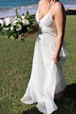 I ordered several dresses from Lulus to try on for my beach elopement in Maui. This was the first one I tried on and I knew it was the one! Very lightweight, simple, and beautiful. The back lace is so beautiful and simple, and the buttons give it a classic touch. Loved it! - Gabrielle C.