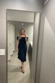 I wore this dress to my friend's winter wedding and it was perfect! It's classy, the color is great for a winter wedding (I paired it with a little shawl for the cold). And it's so flattering! It fits wonderfully on me and I consider myself more of a midsize/"athletic" build. I usually wear around a size 12, the Large fit well. Plus, this dress is comfy enough to dance around in, and no low neckline to worry about a nip slip or anything. - Emma G.