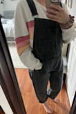 I have tried other long overalls and never quite liked the look or feel of them on me. These are the first that fit right & are so comfortable! They are a bit looser which helps I'm sure, the material is also very soft and you can move in it. The leg part is a bit wider than I would like, however, I think it really works. Any closer to the leg and it would probably not look right. I am typically a S/M and ordered S. Currently postpartum 3 months and the S fits amazing with a lot of nice wiggle room. The black color is so nice and def goes with everything. These will be a staple in my wardrobe - highly recommend them if you're on the fence. - Alyssa L.
