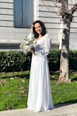 I wore this dress for my wedding at City Hall, which was during the winter, and it was perfect. I felt very pretty in it. It's long so, even with heels, I ended up stepping on the hem of the dress a few times. The quality is very good for the value, and it is a type of dress that does not mark the body, which was great. Very fluid and the fit is perfect - Aline P.