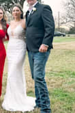 I absolutely loved this dress! My husband was so happy to see me in it at our First look and guests thought it was much more expensive than it was. I wish I could get married over again because I would pick this dress over and over. - Jeniffer G.
