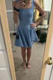 I love this dress. It fits like a glove, the fabric is thick so it's not see-through and it gives the skirt some awesome volume. It makes me want to twirl around in it! The fabric is a little more on the casual side, which also means it's very comfortable. Would recommend it in any color. - Leah G.