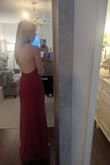 I love the fit of this dress. I typically wear a zero in structured dresses and the XS was perfect. The asymmetrical back and high neck really balanced the classy vibe with the spicy vibe. - Thalia B.
