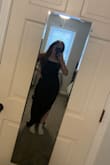 Overall, I don't love the dress but I like it. The ruching in the front is a bit loose and baggy. From the side, it sticks out a little but it's not too noticeable. It's too long for me because I'm 5'1 but it looks great hemmed. It's comfortable and loose-fitting. - Kathryn G.