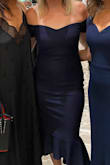 I absolutely love this dress and I have gotten so many compliments while wearing it. I wore it to two of my cousin's weddings. It has the perfect stretch which sucks in the stomach area. It is snug but it does not feel too tight. I love the shape of the dress and the flare on the bottom. It was very comfortable to wear all night and dancing. I will definitely wear it again! - Nicole F.