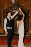 The dress was such good quality, and the material was super thick! I'm not super tall but not short either, and the dress was the perfect length, if not a little bit long even with heels! It was simple, but the back made it still feel fancy and pretty. My wedding was 4 months ago, and I still love my choice! - Hailey G.