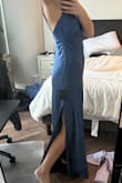 I was very excited to try it, but it fits weirdly around the chest area. I'm probably too small-chested for the dress, but it didn't fit me well at all. The picture looks better than it was in person, but the fabric is slightly bunched under the armpits as well. - Karsyn G.