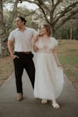 I loved this dress! Like other reviewers said, it fits loose enough up top that the sleeves would fall down which required lots of tape. Regardless, I loved the way the dress looked for my engagement shoot! Very whimsical and dainty. - Lindsey S.