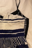 Ordered a small (I am a small across the board), and I felt like I needed to go up to a large. The inseam and rise are very short, and I couldn't get the bodice [to] zip up all the way. I compared this to a dress I bought from Lulus last spring in the same size (small) with a similar shape, and this was 2" smaller across. Whoever sized this was waaayy off - Emily K.