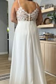 This dress in the back is gorgeous but did not do anything for me in the front, personally. A bit bland. - Felicia E.