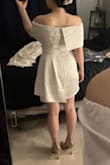 Honestly, I ordered this one as a gamble, thinking I'd probably hate it on me and end up returning. Turns out, I absolutely adore it, and this is going to be my wedding reception dress! It's super comfy, and on someone my height, the length of the shorter side hits just right (not too risqué). It's flattering without any need for shapewear or sucking in.   
Worth noting: I selected "a little loose" for the fit not because it was loose on me, but because the waist might be too loose on someone with a 26-27 waist, as indicated on the guide for a size small. I ordered the small expecting it to be a bit too tight on my 28" waist, but it actually fits me perfectly and comfortably (so much for my plan to use it as weight loss motivation hehe). - Jen H.