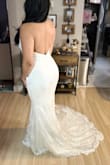As another review states, the dress is too heavy so it sags and doesn't sit right. Otherwise, it's BEAUTIFUL and I am obsessed with the train. It fits perfectly from the stomach down, booty POPPING, and my back rolls don't show! The boob area did feel a little loose, once again, because it sags. This is my runner-up in case I don't find another dress, but it will need tailoring and body tape so it sits right. - Diana C.