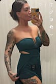 This stunning jumpsuit features a vibrant emerald green color that is sure to turn heads. The strapless design adds a touch of elegance, while the cutout detailing on the sides adds a hint of sexiness. The wide-leg silhouette gives the jumpsuit a chic and modern look, making it suitable for any occasion. Whether you're attending a formal event or a night out with friends, this jumpsuit will make you stand out and make a statement. Its comfortable and flattering fit makes it a must-have for every fashionista. Pair it with heels and statement jewelry for a complete and stylish look. - Melisa H.