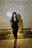 I have never had a dress this style fit my body so well. The fabric is stretchy and comfortable, but it doesn't look cheap like some stretch fabrics do. It hugs in all the right places and really flatters my figure. I have a larger bust, and the neckline was fine... a little sexy but not inappropriate. This was perfect for an upscale dinner! - Mikayla C.