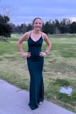 My 16-year-old wore this to winter formal and it looked great on her. She is thin and athletic build, most XS stuff looks like it is tailor-made for her. The straps could've been tighter so we added a hair tie pulling the straps together. Worked perfectly, her hair covered it. I will be coming back for more school dances! - Greta P.