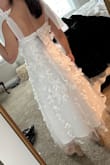 I can't wait to wear this to my spring bridal shower. It is slightly see-through, but nothing a slip skirt underneath can't fix. it looks just as pictured! The top part is a little large for me, so I may have it altered to fit more snug to my chest as it does gap pretty decently. I ordered a small and it was definitely true to size. I am 5"3, 130 pounds and 32B. - Nicole D.