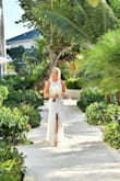 I am obsessed with this dress! It was perfect for my beach wedding and I felt amazing in it. It does run a little small and doesn't have tons of stretch - so if you are in between sizes, I would recommend sizing up. - Marta H.
