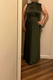 I am 5ft4, 140lbs, and a size small. This dress is perfect. I purchased it for a wedding and could not have been any happier. I ordered a medium and small and the small was perfect. Truly recommend. Fits well, length is perfect with heels. True to size. - Elizabeth J.