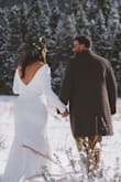 This dress is beautiful! It's timeless, elegant, and simple. It fits fairly true to size, but it ran a little large on me (as I'm in between sizes and because I didn't want to size down, given my height or shoulder width). I spent another $50 or so on some alterations; it was absolutely perfect, but it shouldn't be an issue or need to [be done] for brides of a more average height and smaller build. The quality of the material was good; it was strong and durable, with a good lining. It also has a bit of stretch, so it's quite forgiving. I still recommend some good shapewear to smooth things out and remove any panty or bra lines. Overall, really great dress and experience with Lulus. - Natasa D.