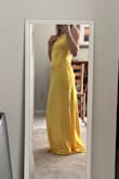 I absolutely love the dress! I originally got a small, but it was a lot tighter than expected, as the material has no stretch. So I sized up. Just needs a few alterations but it's gorgeous and high quality. I've literally wanted this since I saw 10 things I hate about you like 9 years ago. - Anne H.