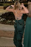 The quality was great- not see through at all. I'm a bit on the short side so the dress was very long, but I pinned the bottom and it was great. If you have a smaller chest, I would definitely invest in some form of backless push-up bra to help you out in that department. I thought the back was very flattering, and I love how the straps that lace up at the back really make the dress adjustable to your bust size. I wore this for a college athlete's formal and got a ton of compliments. I will definitely wear this again to another event!! - Ally H.