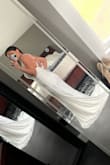 I ordered this dress for our 11-year vow renewal. It's comfortable, and the straps are adjustable for the top. It's a little long for me and since ordered I've lost some weight. So for that reason, I'll have it taken in and the length altered as well. It's beautiful, simple, comfortable, and affordable! I also had a belt sewn onto it. Makes a huge difference. I love it! - Johnna A.