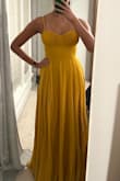 I always get S from Lulus and have had great success with the fit! This one ultimately fit fine but was much too large in the bust. I sized it down to a XS. It still fit, but the bust looked bizarre. I think the dress would really benefit from having cups or some structure to the bust. The color is absolutely beautiful though! The pics are of the XS. - Vindhya R.