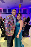I wore this dress to a charity event & received so many compliments! It was super flattering & the color was beautiful! It did run a tad big, I [may have been able to size] down to a medium, but it worked! It was too long for my 5'2" stature- but that's pretty normal! I was worried about it being too snug in the stomach area as I have a small mom pooch- but it wasn't! Love this dress! - Nik H.