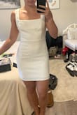 Very cute fits very well. Bust is a bit big but will fit a strapless bra and be perfect. Love the length, not too short but fingertip-length! - Evonne S.
