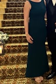 This dress is gorgeous. The color is beautiful and the material is thick so it hides a lot of flaws. There is no zipper on this dress so getting into it was a little difficult, I had to pull over my head instead of pulling up over my hips. To me, it wasn't a big deal and I would highly recommend it! - Alex P.