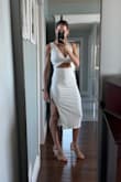 This dress is amazing. Fits just as it's shown on the model. The cutouts are all placed perfectly. The material is high quality and soft. - Amanda D.