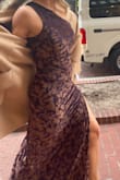 Perfect dress for my occasion. The material is soft and stretchy. It was thick as well, so I stayed warm. (Sorry I only have goofy photos to share) - Jenni