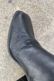 I've been wearing the boots for 2 hours, and it started drizzling outside. By the time I walked in from the car to my front door, they were puckered, and the faux leather was bubbling. I understand they shouldn't get wet, but this is absolutely ridiculous. I've never had something warp so fast. - Danielle M.