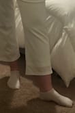 If you're tall, this is not for you. I ordered a L and XL, and neither of them was the same length as the display image. The pant leg hit me mid-shin. The material is see through. The jumpsuit fit me perfectly (besides length), but the material stretches and makes it look like it's pulling in the hip area. - Alyssa S.