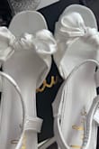 I love the design of the shoes, along with the color! I'm not very happy about there being a few stains on my newly white heels! I received them in the mail like this. I would understand if they were used, but Lulus should not be sending stained heels to new customers! - Sophie C.