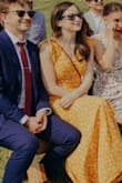 I love this dress and color. I love the open back but I did have cups sewn in. The dress is long so I always wear wedges. - Emily W.