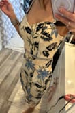 This dress is beautiful on! Thought it was really pretty when I saw it online, but when I pulled it out of the package I wasn't sure about it. Once I got it on it was a completely different story! So pretty!! Unfortunately, it's a little big. Ordered 2 other dresses in XS and both fit, but this XS did not. I'd like to size down but it's out of stock! :( Hoping it comes back in stock before my event! - Grace B.