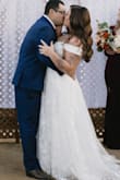 Lulus absolutely saved my wedding! My original dress was butchered at the tailor so I panicked and ordered 10 dresses from Lulus a month before my wedding. They were shipped super quick and I ended up loving this dress even more than my original. I put it on and immediately felt like a princess. I ordered the largest size. I was able to get it zipped but it was VERY snug. I ended up taking it to a new tailor and had the zipper replaced with a lace-up back for a better fit. I loved this dress so, so much and felt so beautiful in it! - Destiney M.