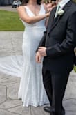 I had such a hard time finding a wedding dress that wasn't itchy and heavy. This dress fits like a glove. The material it's lined with is very soft. The lace detail is absolutely beautiful. I felt like a million bucks on my wedding day! - Isabella C.