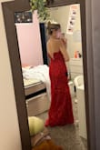 The dress that the model has on is supposedly an "XS" which is why I purchased an xs, but was too small on me. Nothing too bad. It just didn't reach the floor and wouldn't zip comfortably. All around a good quality dress. I would just double-check the size measurements! - Ellie F.