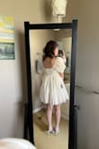 I ordered a size down from my normal medium based on the other reviews and I'm so glad I did because the small fits perfectly! All I have to do is to dewrinkle a bit.  My shoulders are broad and the sleeves fit and are more flattering than I thought they'd be. The material is not see through and it is very comfortable.  10/10 - Leah A.
