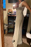Absolutely love this dress and the way it flows and falls on my body. I have always been curvy so dress fitting has been a very unique process. I am also short so hemming is needed, which I anticipated but refuse to pay more than the dress for this. I am grateful to have a seamstress that will hem for $200! This dress has stunning beadwork and lays beautifully. - Jennifer M.