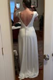 Absolutely love it! The dress is just as pictured. It's the only one I bought, I love it so much I won't be trying on any more! The material is thick and looks expensive. Timeless dress. - Sofia H.